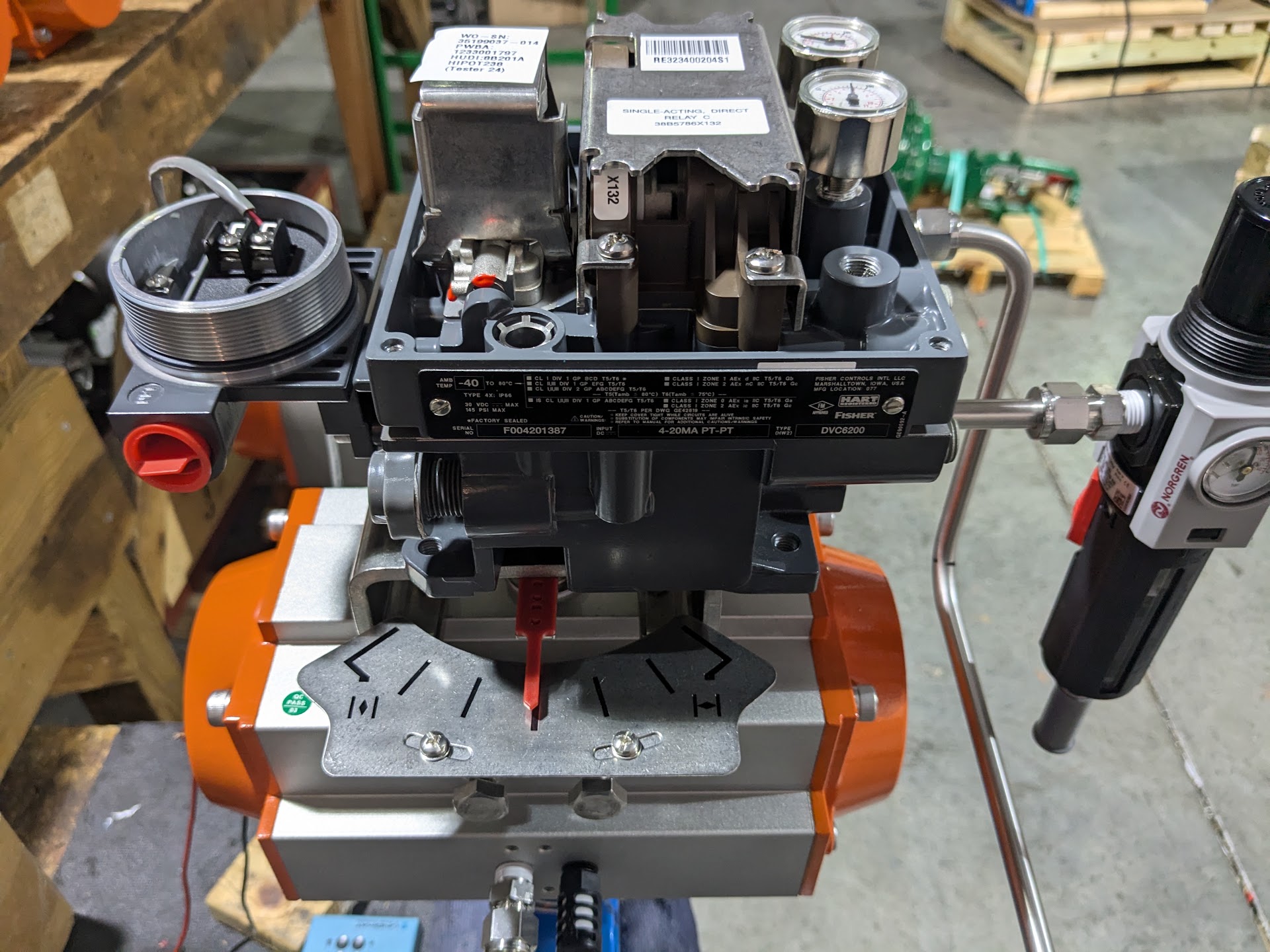 Smart positioner being calibrated on a valve assembly